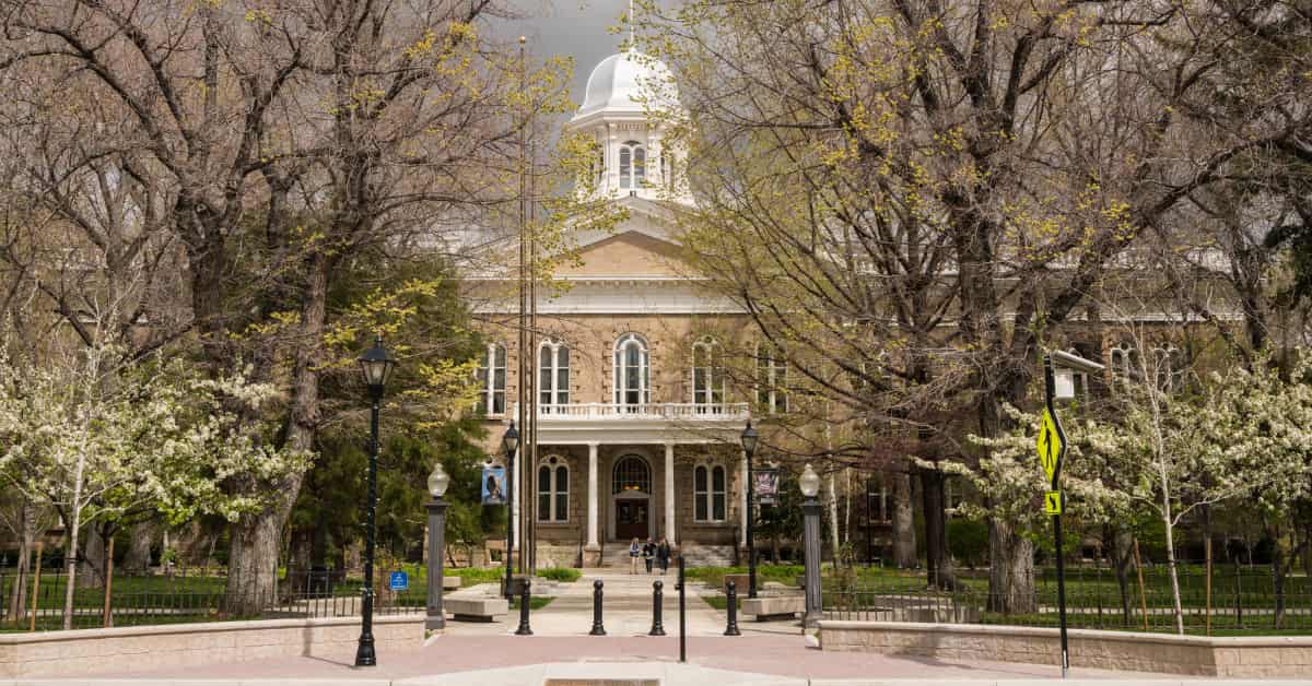 Nevada state building surrounded by trees and walkway.
