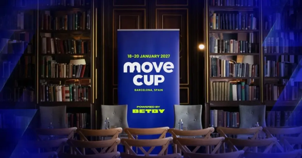 BETBY-powered MOVE Cup banner at the Barcelona press conference, surrounded by bookshelves.